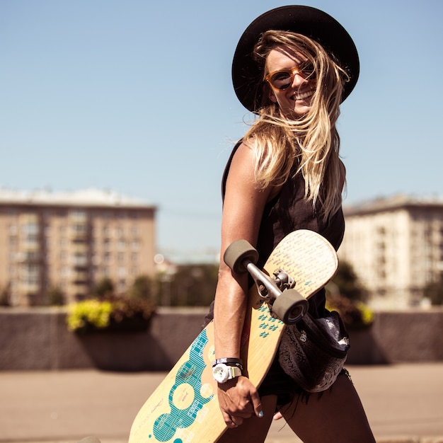 the girl skates on skateboard