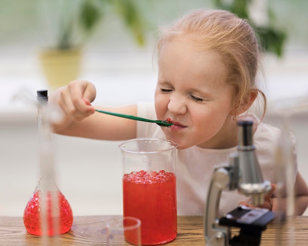 Girl smelling experiment