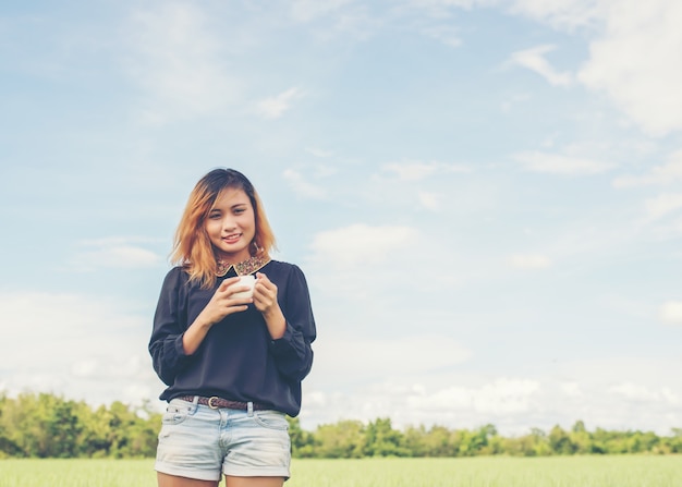 Girl smiling in the greenfield