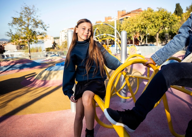 Girl spending time in the park with her friend