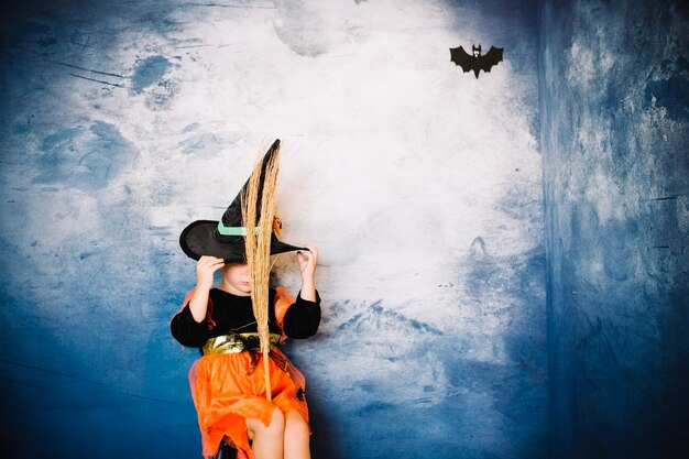 Free photo girl in spooky witch costume