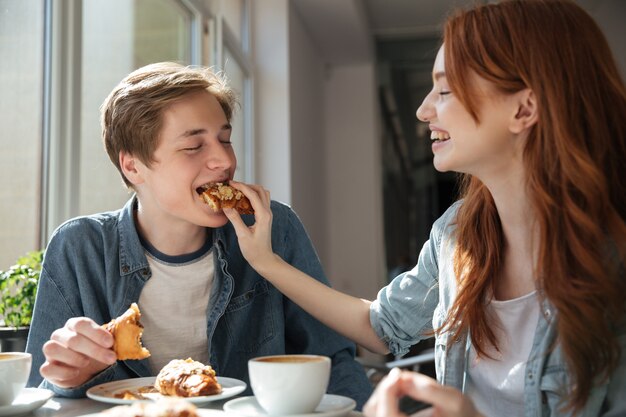 Girl student feed her boyfriend