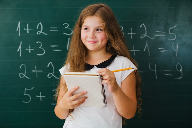 Girl student with notepad