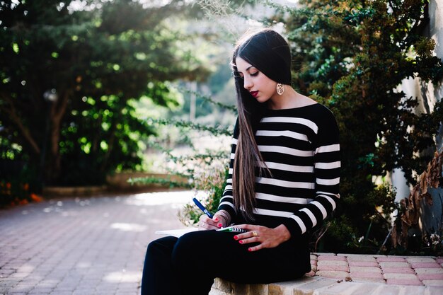 Girl studying in nature