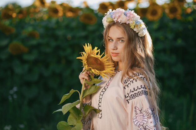 girl and sunflowers