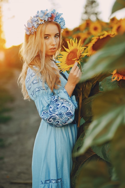 girl and sunflowers