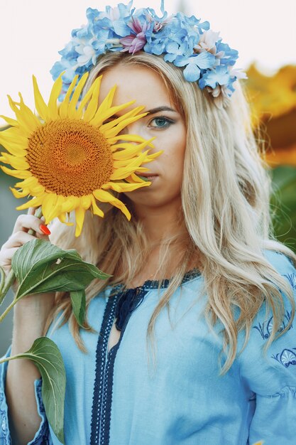 girl and sunflowers