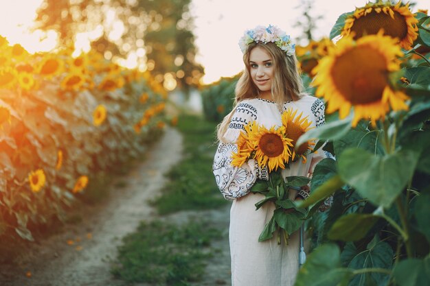 girl and sunflowers