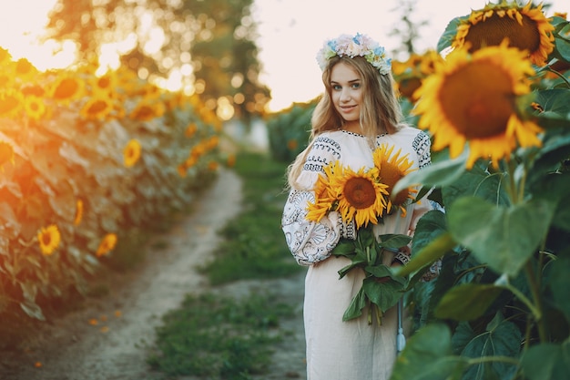 girl and sunflowers