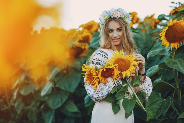 girl and sunflowers