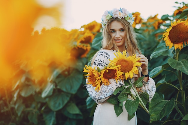 girl and sunflowers