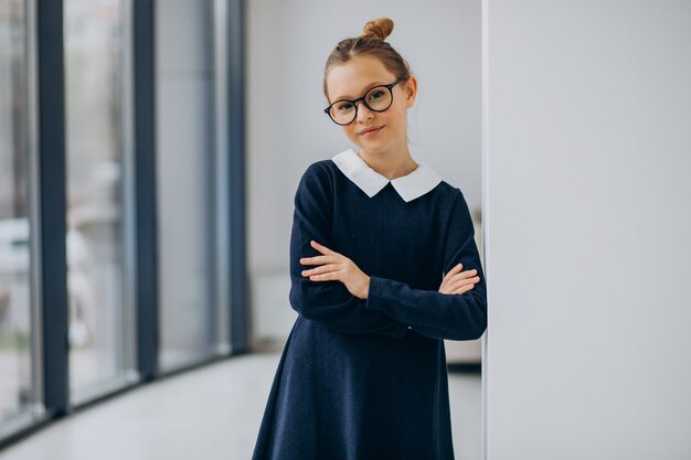 Girl teenager in school uniform