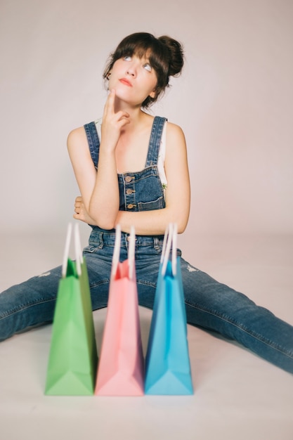 Girl thinking after shopping