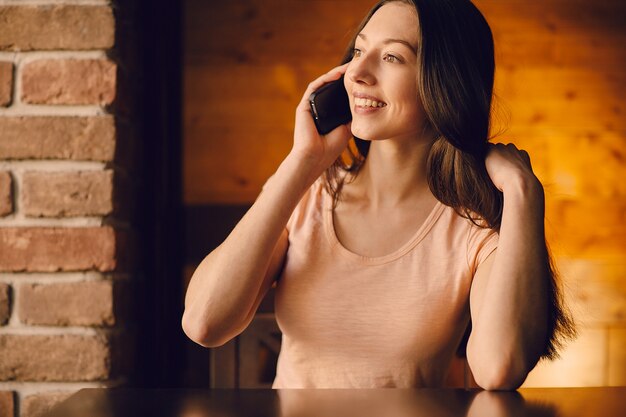 Girl touching her hair while talking