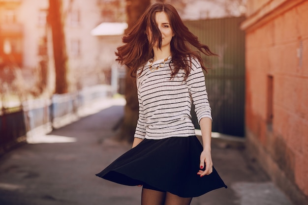 Free photo girl turning with skirt