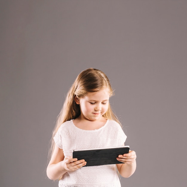 Free photo girl using tablet