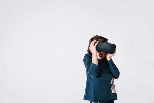 Girl in VR headset screaming