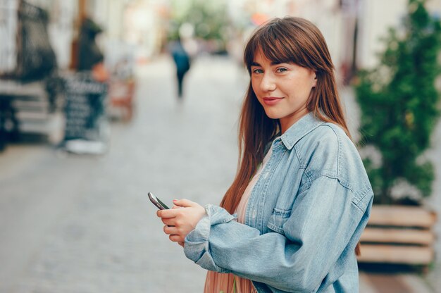 Girl walks around the city. 