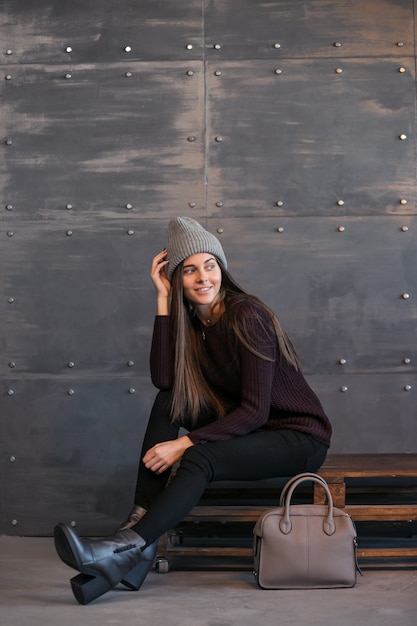 Girl in warm cloths in studio