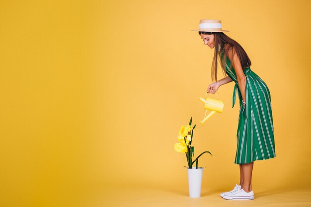 Girl watering flowers