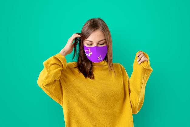 Free photo girl wearing face mask to prevent covid 19