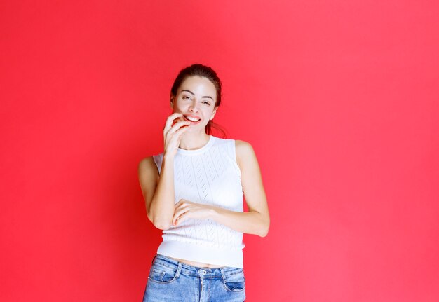 Girl in white shirt thinking and planning. 