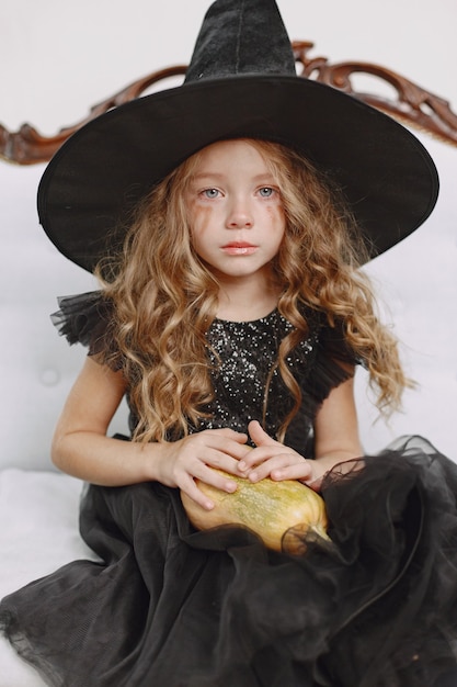 Girl in witch costume