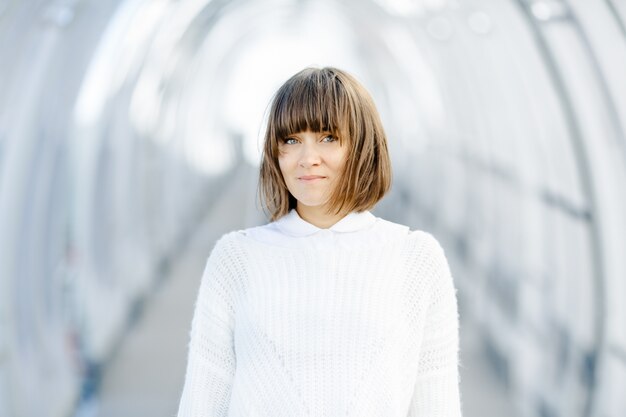 Girl with beautiful eyes wearing all white