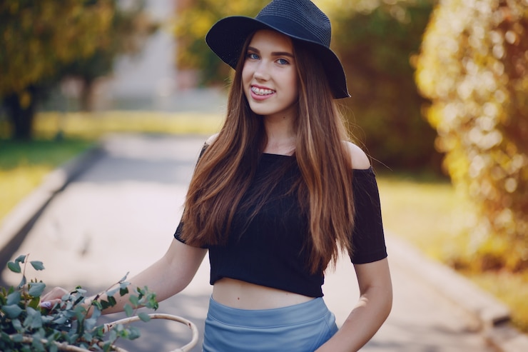 Free Photo girl with a bike