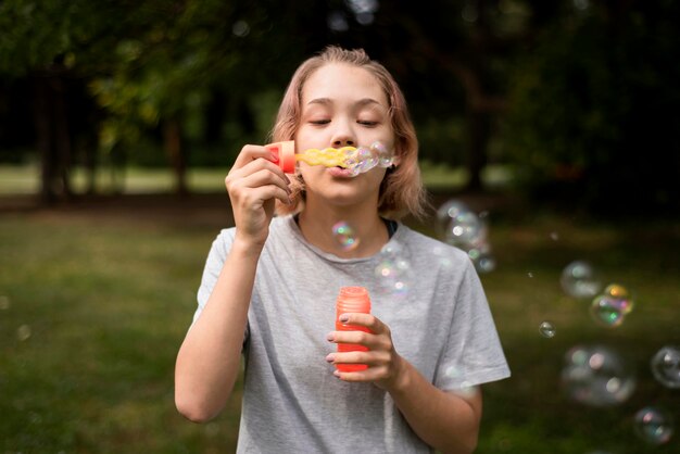 Girl with bubbles toy