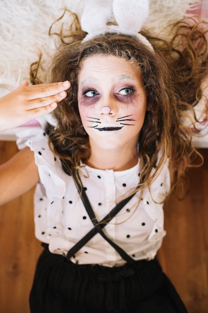 Free photo girl with bunny whiskers from above