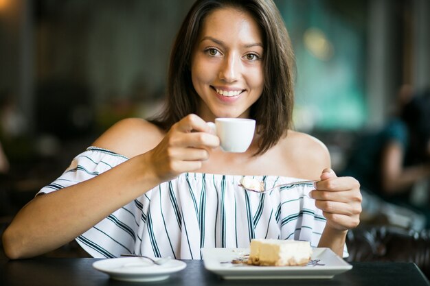 Girl with cheesecake