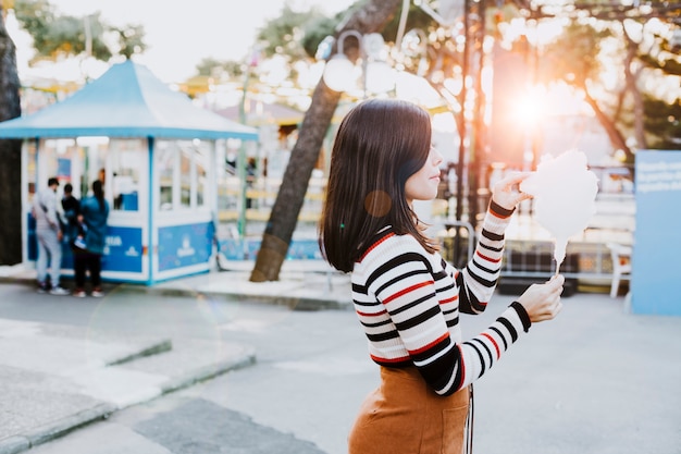 Free photo girl with cotton candy