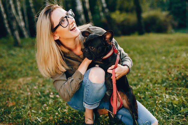 Girl with french bulldog