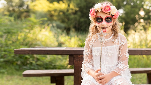 Free photo girl with halloween costume