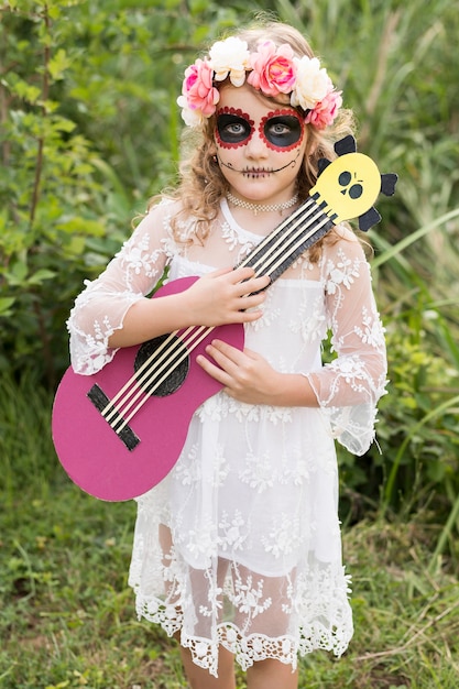 Free photo girl with halloween costume