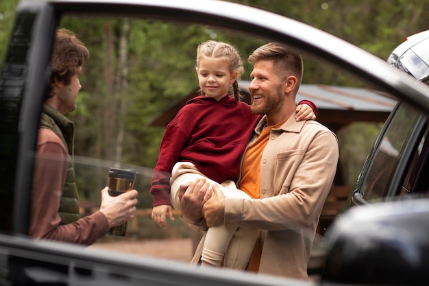 Girl with her dads enjoying family trip