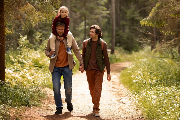 Girl with her dads enjoying family trip