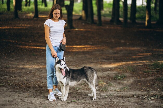 Girl with her dog in park