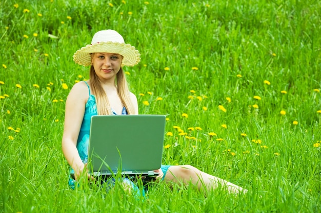 Girl with laptop outdoor