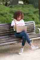 Free photo girl with a laptop