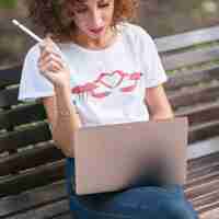 Free photo girl with a laptop