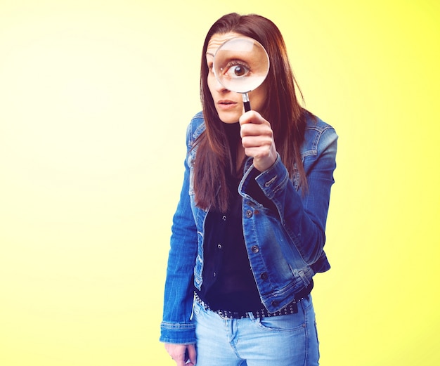 Girl with a magnifying