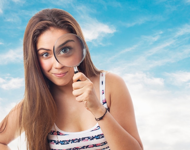 Girl with a magnifying