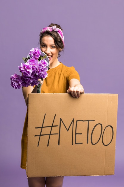 Girl with "me too" equality gender sign