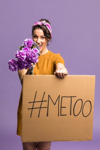Girl with "me too" equality gender sign
