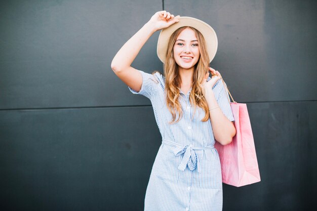 Girl with package smiling