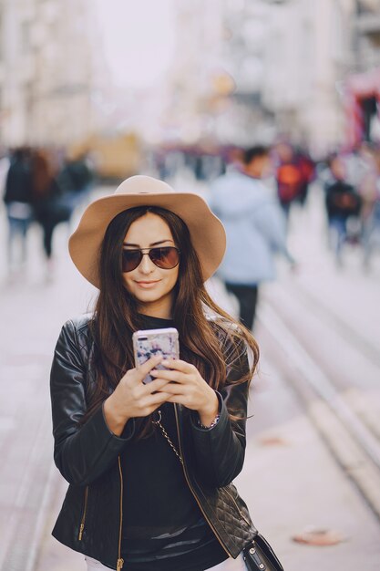 girl with phone in istanbul