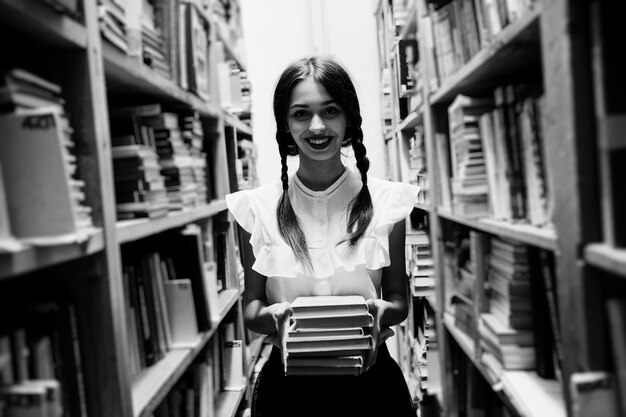 Girl with pigtails in white blouse at old library