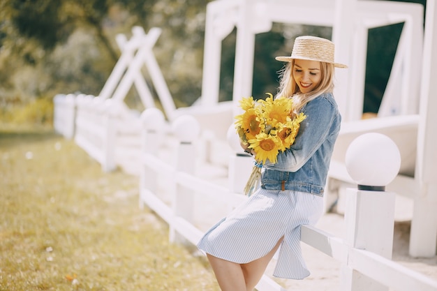 Free photo girl with sunflowers